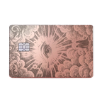 Celestial Eye luxury metal card with ornate engraved artwork in glossy rose gold finish