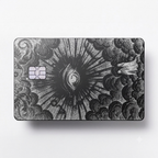 Celestial Eye luxury metal card with ornate engraved artwork in matte black and silver finish